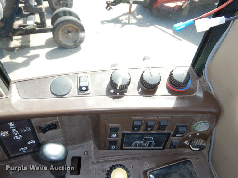 image for item DN8680 1999 John Deere 6310 MFWD tractor