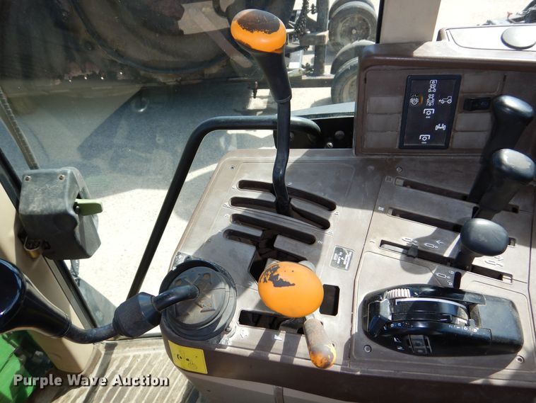 image for item DN8680 1999 John Deere 6310 MFWD tractor