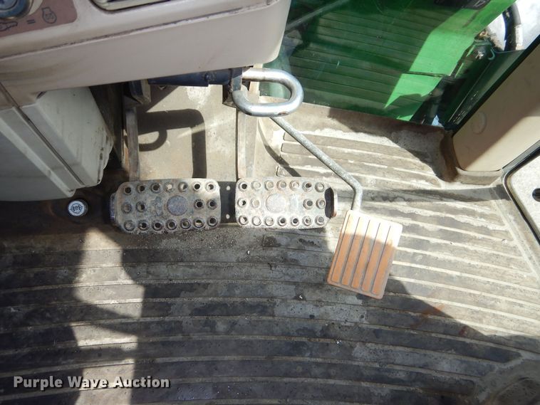 image for item DN8680 1999 John Deere 6310 MFWD tractor