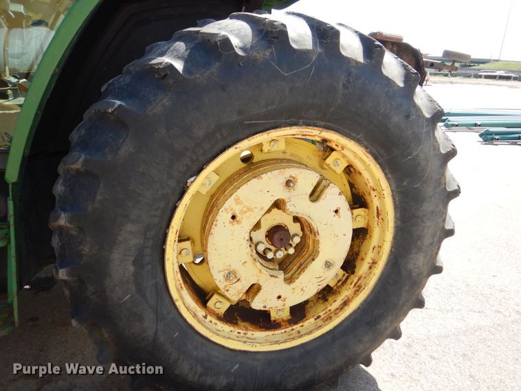 image for item DN8680 1999 John Deere 6310 MFWD tractor