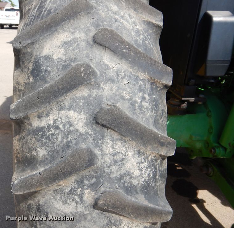 image for item DN8680 1999 John Deere 6310 MFWD tractor