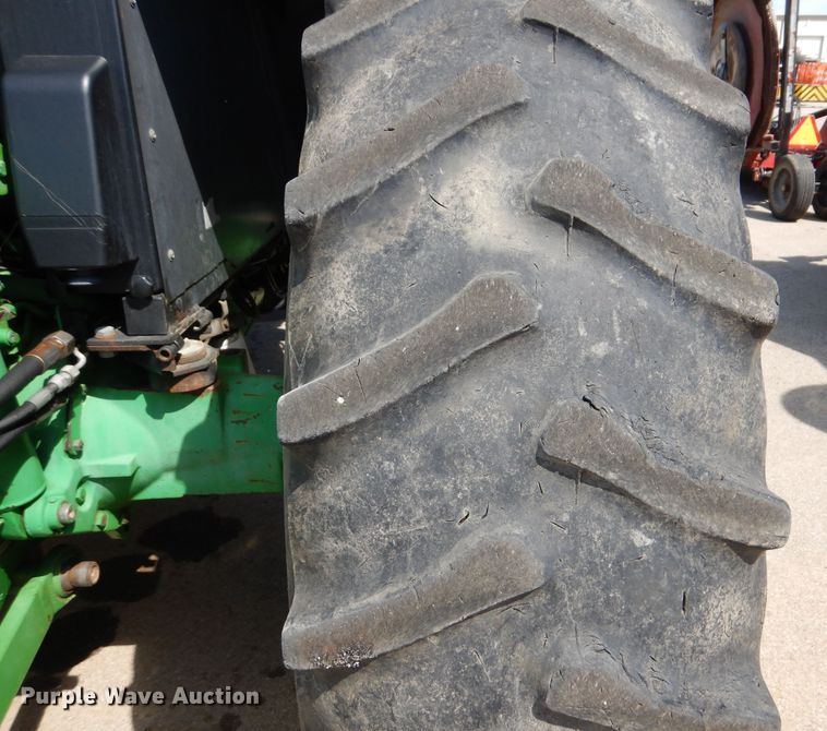 image for item DN8680 1999 John Deere 6310 MFWD tractor