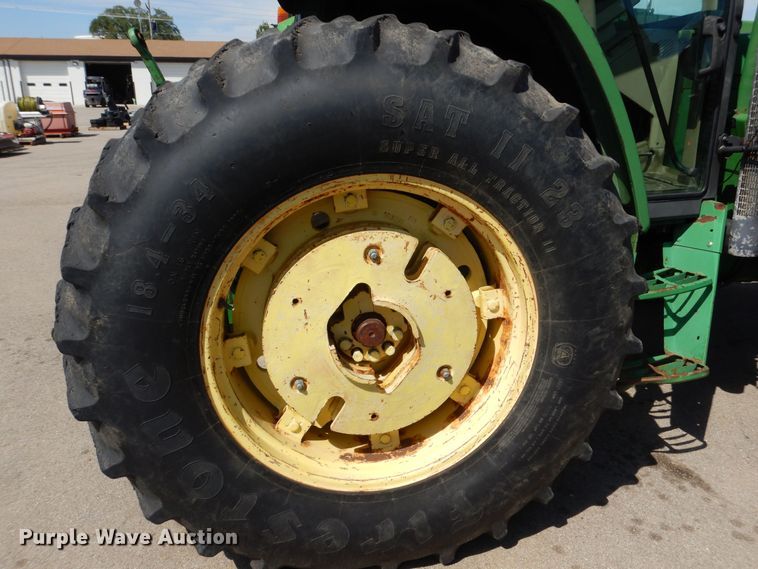 image for item DN8680 1999 John Deere 6310 MFWD tractor