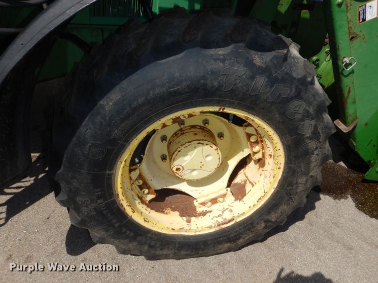 image for item DN8680 1999 John Deere 6310 MFWD tractor