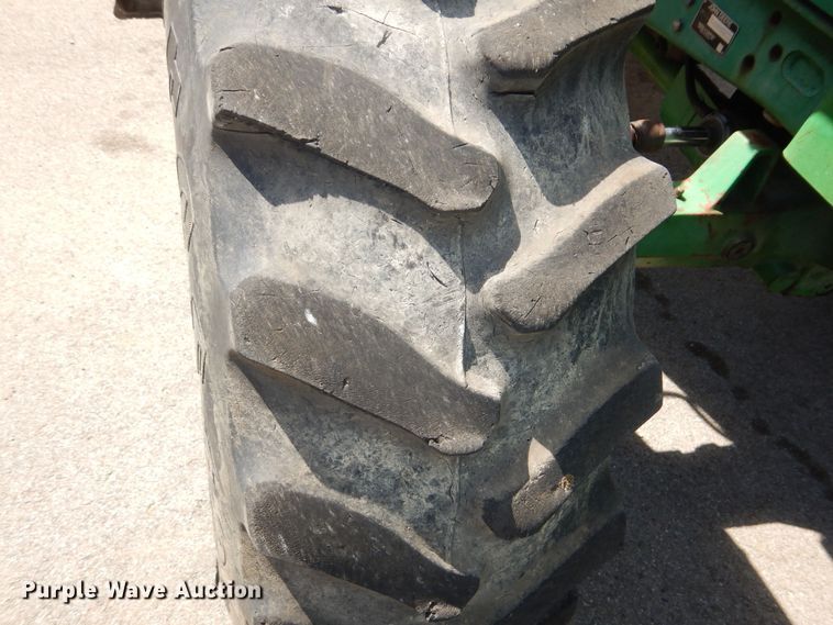 image for item DN8680 1999 John Deere 6310 MFWD tractor