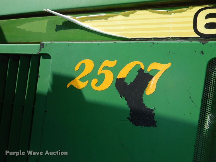 image for item DN8680 1999 John Deere 6310 MFWD tractor