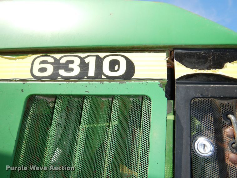 image for item DN8680 1999 John Deere 6310 MFWD tractor