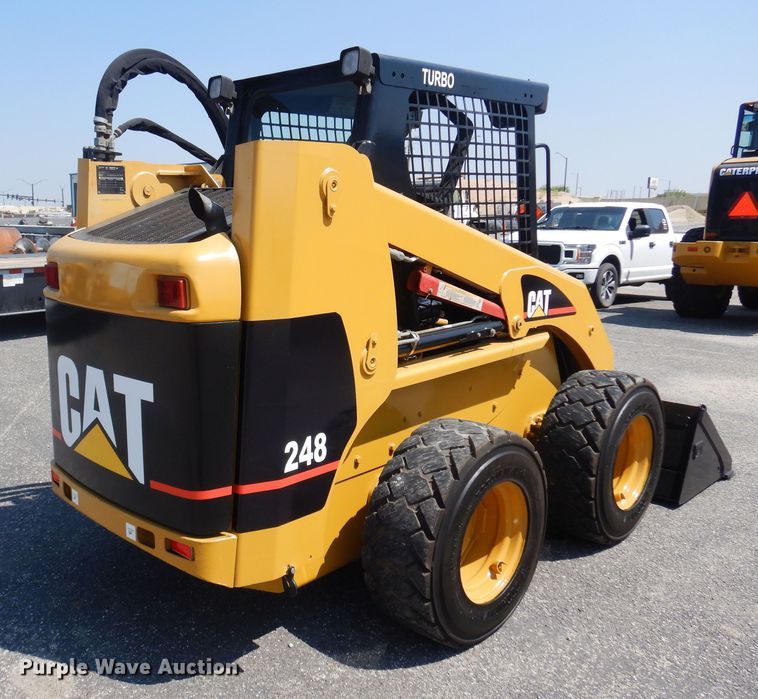 image for item NF9041 2002 Caterpillar 248  skid steer loader