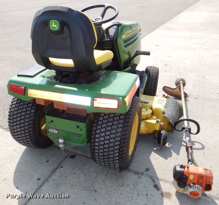 image for item NU9265 2000 John Deere 325 lawn mower