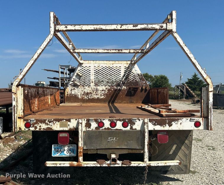 image for item DJ6312 2005 Ford F450 Super Duty  Crew Cab flatbed truck