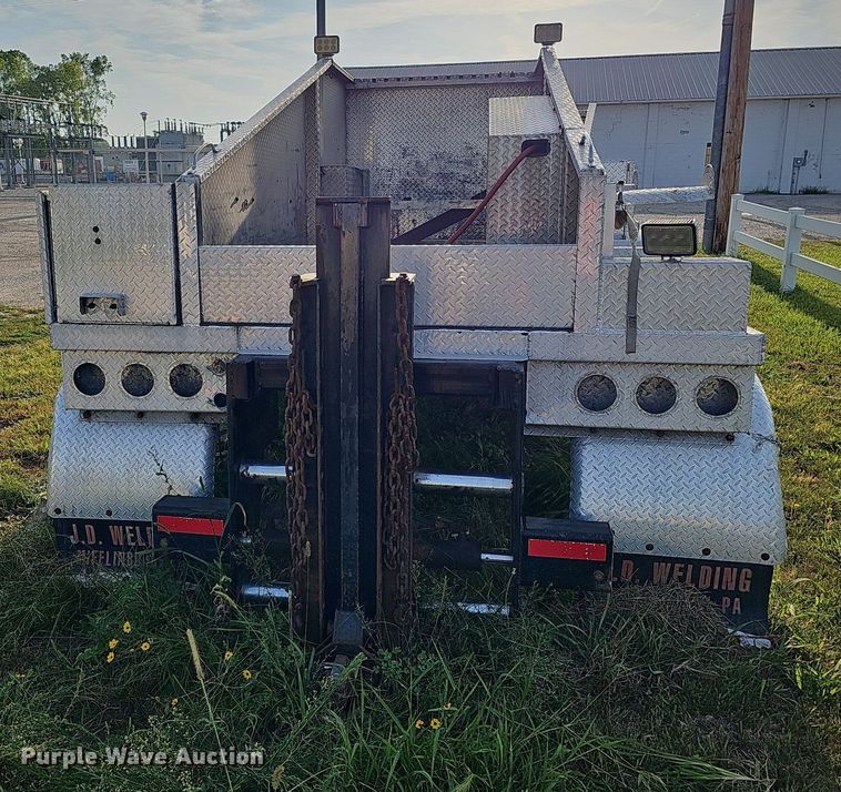 image for item DQ0252 2014 JD Welding & Sandblasting LLC  mobile home toter bed