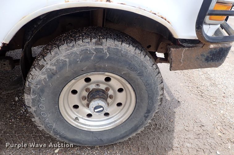 image for item DS7156 1997 Ford F250 HD  SuperCab bale bed pickup truck