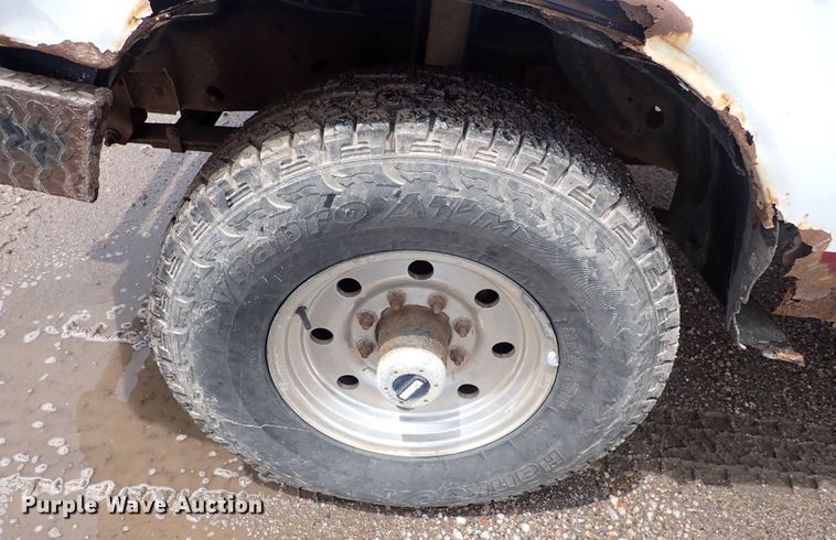 image for item DS7156 1997 Ford F250 HD  SuperCab bale bed pickup truck