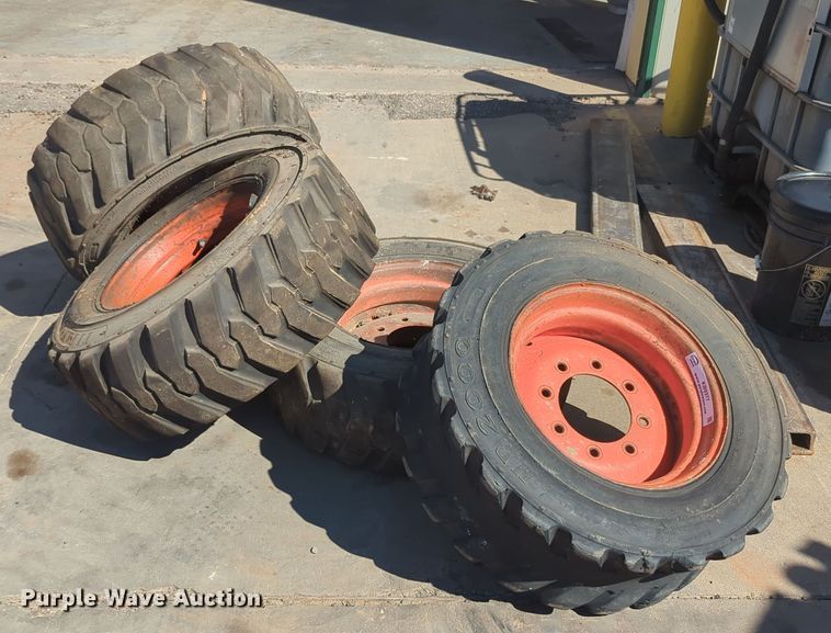 image for item KB9377 (4) 10-15.5NHS skid steer tires and wheels