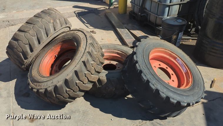image for item KB9377 (4) 10-15.5NHS skid steer tires and wheels