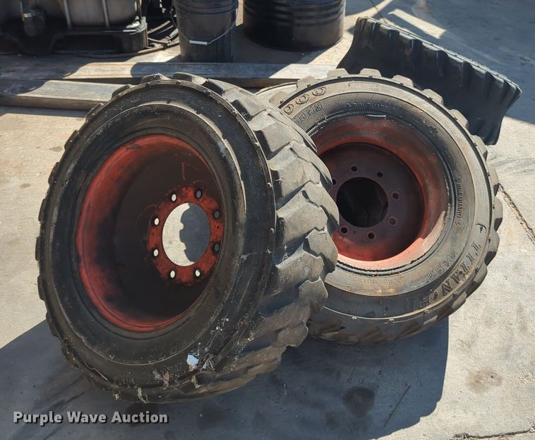 image for item KB9377 (4) 10-15.5NHS skid steer tires and wheels