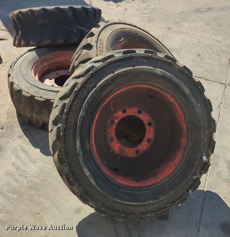 image for item KB9377 (4) 10-15.5NHS skid steer tires and wheels