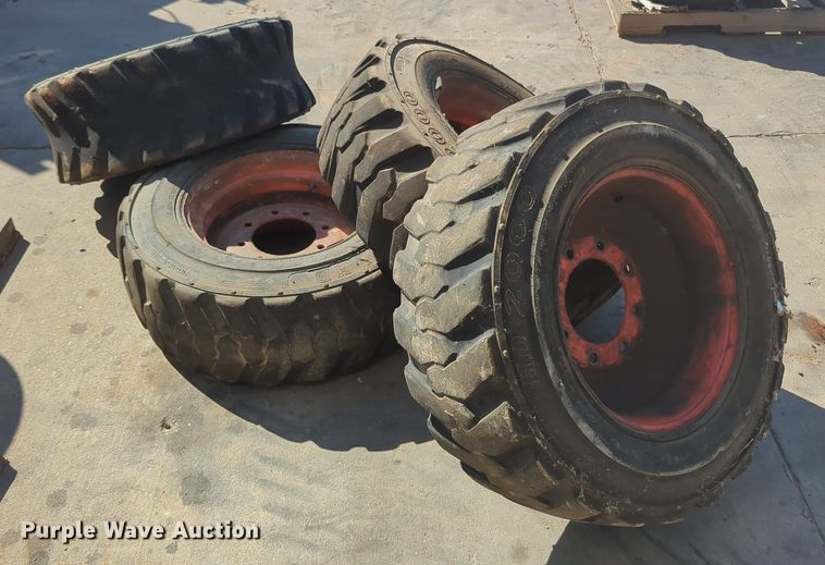 image for item KB9377 (4) 10-15.5NHS skid steer tires and wheels