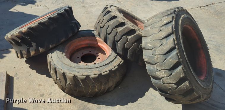 image for item KB9377 (4) 10-15.5NHS skid steer tires and wheels