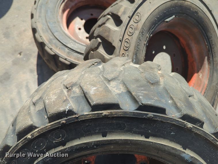 image for item KB9377 (4) 10-15.5NHS skid steer tires and wheels