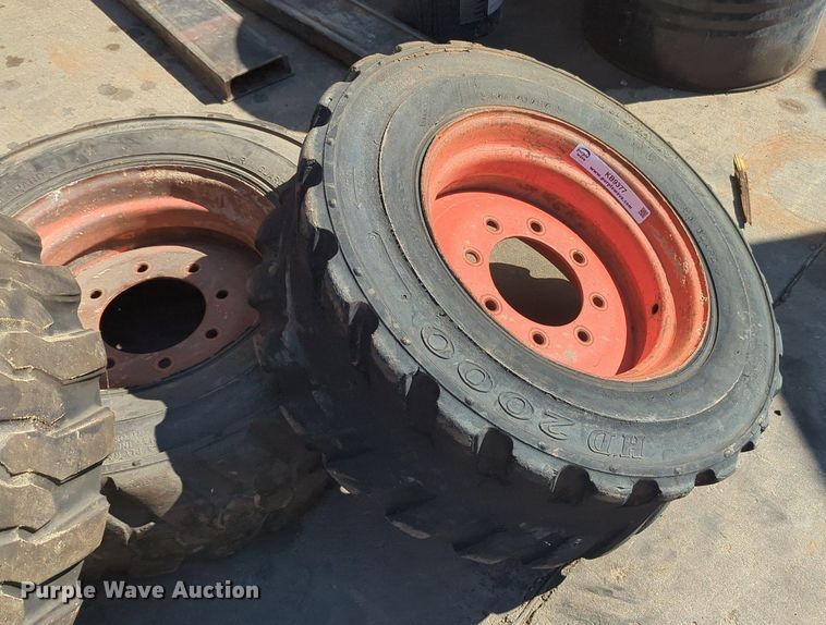 image for item KB9377 (4) 10-15.5NHS skid steer tires and wheels