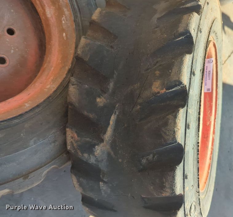 image for item KB9377 (4) 10-15.5NHS skid steer tires and wheels