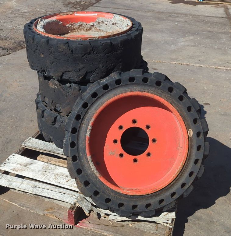 image for item KB9378 (4) 31x10-20 skid steer tires and wheels