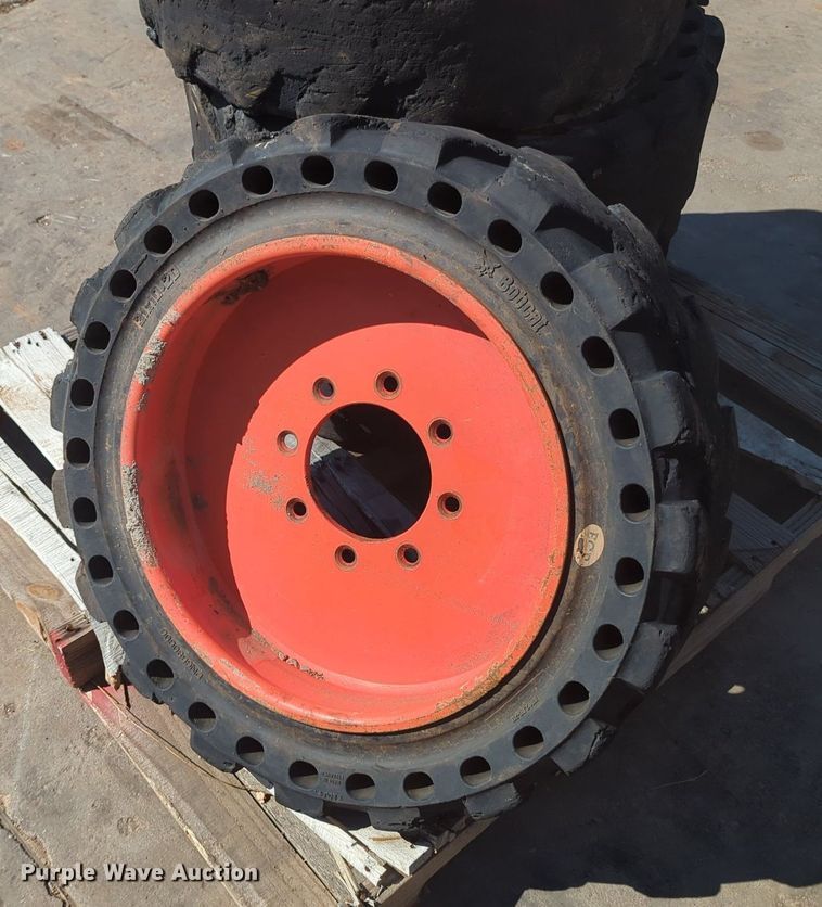 image for item KB9378 (4) 31x10-20 skid steer tires and wheels