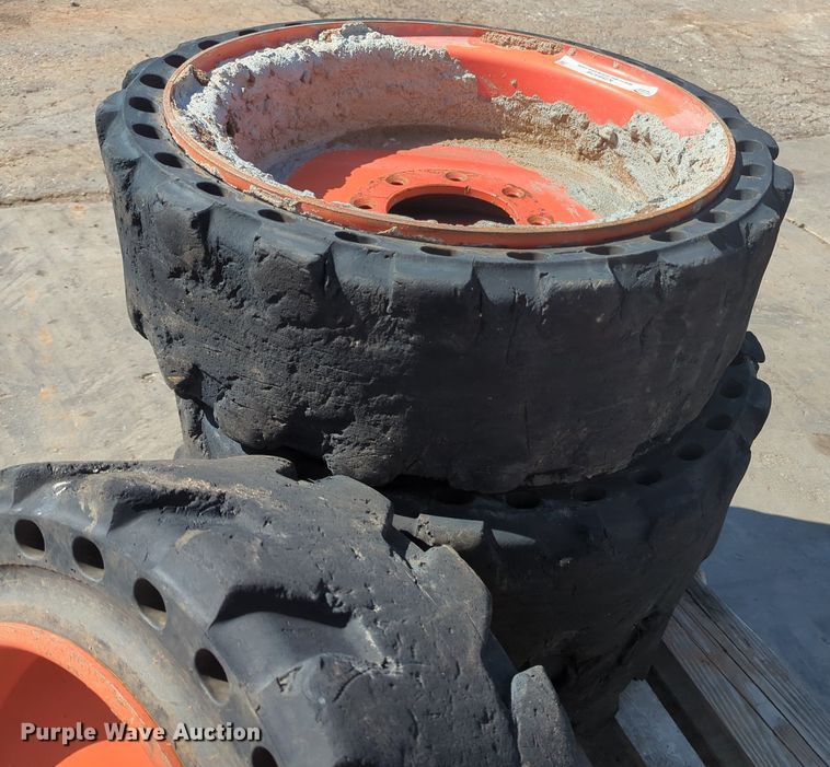 image for item KB9378 (4) 31x10-20 skid steer tires and wheels