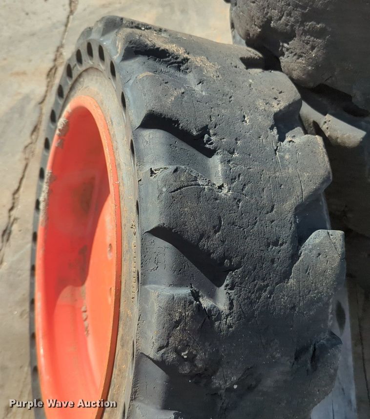 image for item KB9378 (4) 31x10-20 skid steer tires and wheels