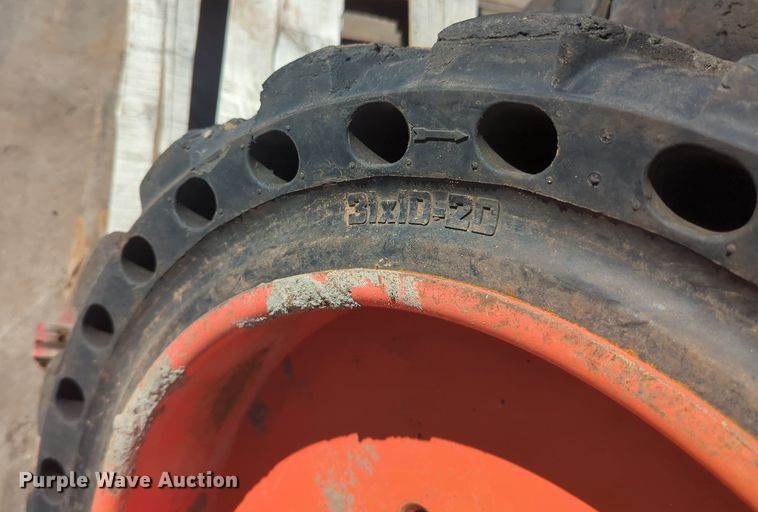 image for item KB9378 (4) 31x10-20 skid steer tires and wheels