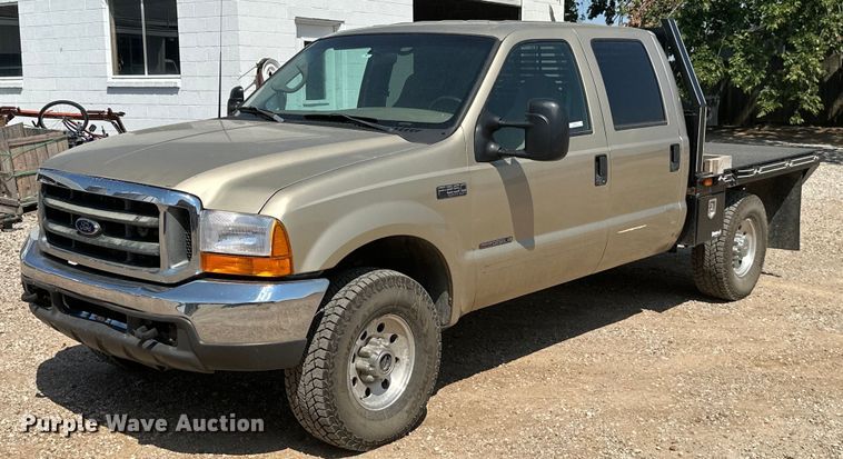 image for item ML9275 2000 Ford F250 Super Duty  Crew Cab bale bed pickup truck