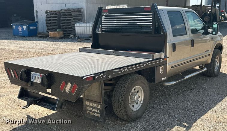 image for item ML9275 2000 Ford F250 Super Duty  Crew Cab bale bed pickup truck