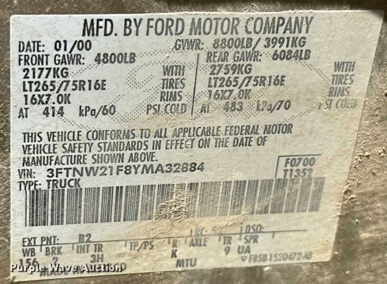 image for item ML9275 2000 Ford F250 Super Duty  Crew Cab bale bed pickup truck