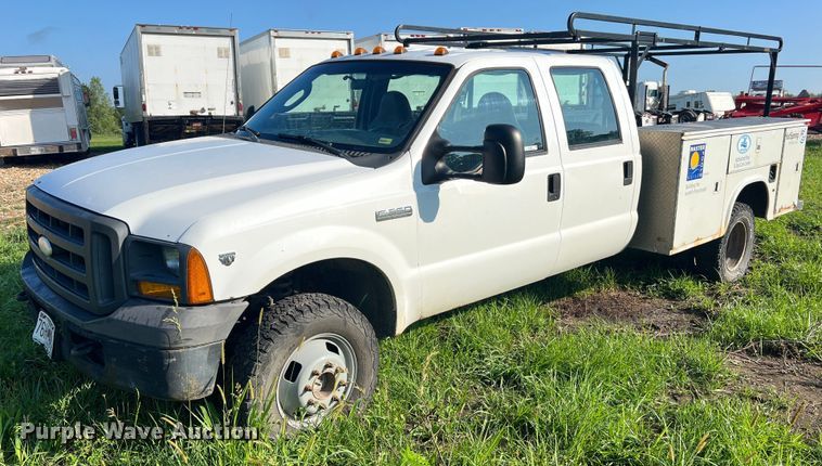 image for item NA9086 2005 Ford F350 Super Duty XL  Crew Cab utility bed pickup truck