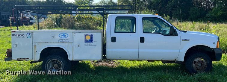 image for item NA9086 2005 Ford F350 Super Duty XL  Crew Cab utility bed pickup truck