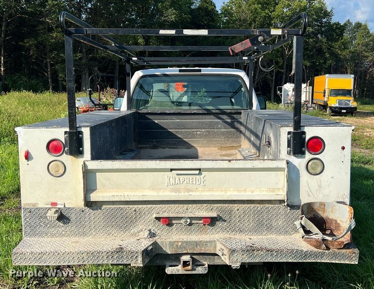 image for item NA9086 2005 Ford F350 Super Duty XL  Crew Cab utility bed pickup truck