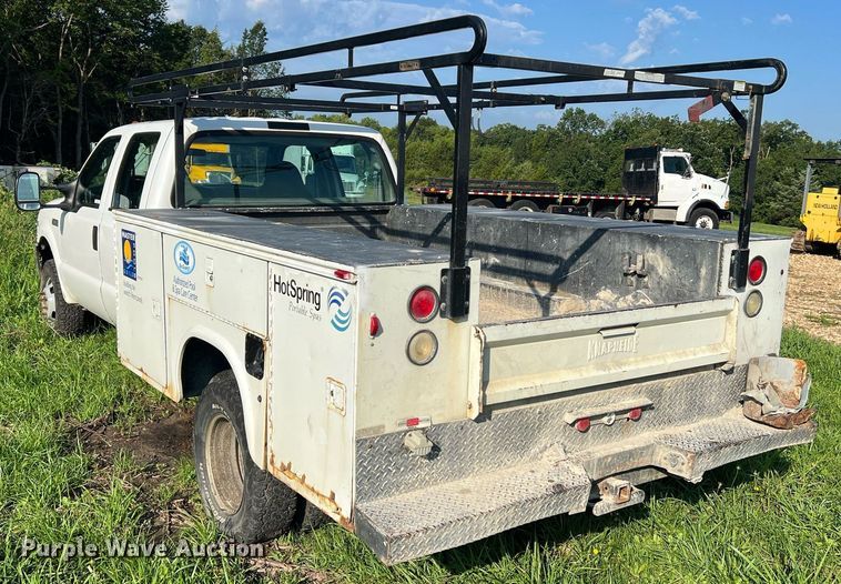 image for item NA9086 2005 Ford F350 Super Duty XL  Crew Cab utility bed pickup truck