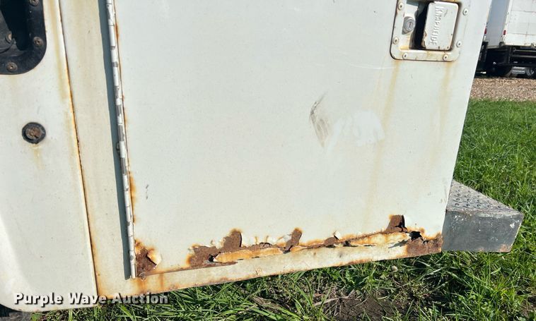 image for item NA9086 2005 Ford F350 Super Duty XL  Crew Cab utility bed pickup truck