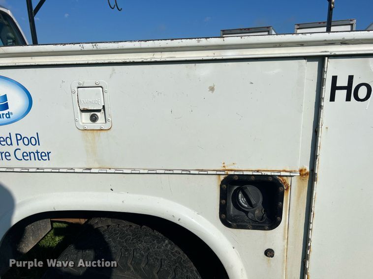 image for item NA9086 2005 Ford F350 Super Duty XL  Crew Cab utility bed pickup truck