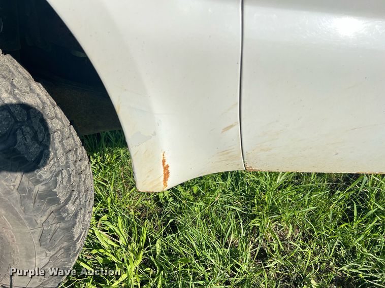 image for item NA9086 2005 Ford F350 Super Duty XL  Crew Cab utility bed pickup truck