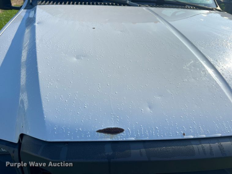 image for item NA9086 2005 Ford F350 Super Duty XL  Crew Cab utility bed pickup truck