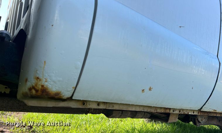 image for item NA9086 2005 Ford F350 Super Duty XL  Crew Cab utility bed pickup truck