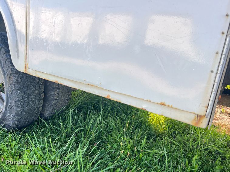 image for item NA9086 2005 Ford F350 Super Duty XL  Crew Cab utility bed pickup truck