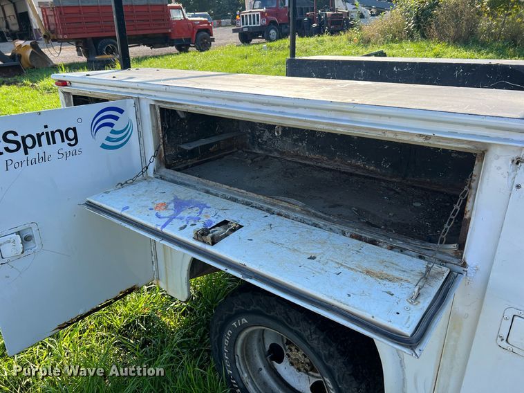 image for item NA9086 2005 Ford F350 Super Duty XL  Crew Cab utility bed pickup truck