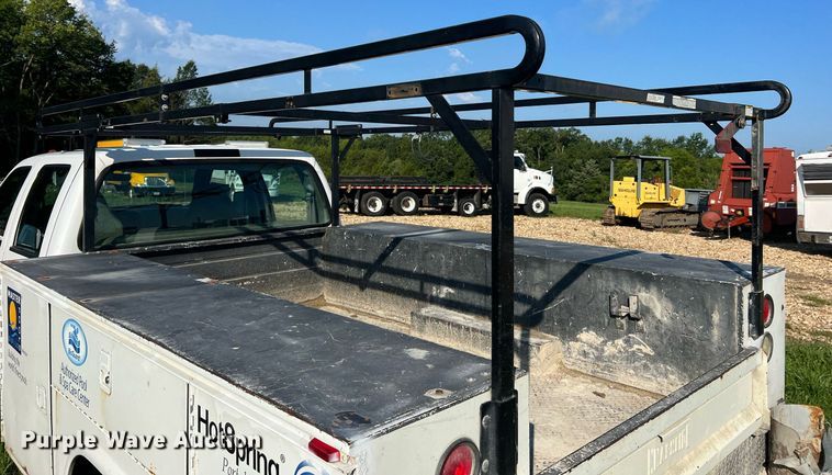 image for item NA9086 2005 Ford F350 Super Duty XL  Crew Cab utility bed pickup truck