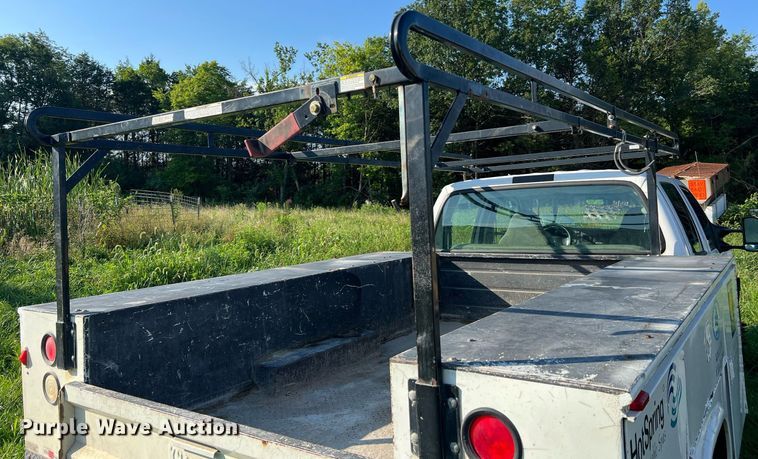 image for item NA9086 2005 Ford F350 Super Duty XL  Crew Cab utility bed pickup truck