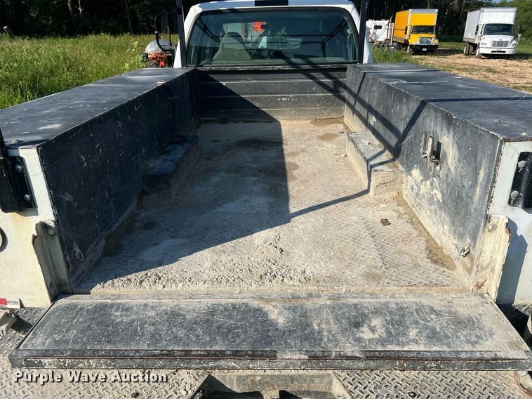 image for item NA9086 2005 Ford F350 Super Duty XL  Crew Cab utility bed pickup truck