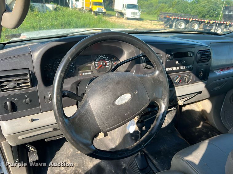 image for item NA9086 2005 Ford F350 Super Duty XL  Crew Cab utility bed pickup truck