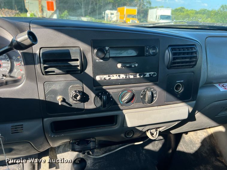 image for item NA9086 2005 Ford F350 Super Duty XL  Crew Cab utility bed pickup truck